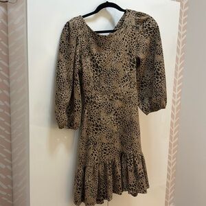Leopard print dress with open back / bow detail. Anthropologie. Size 6.